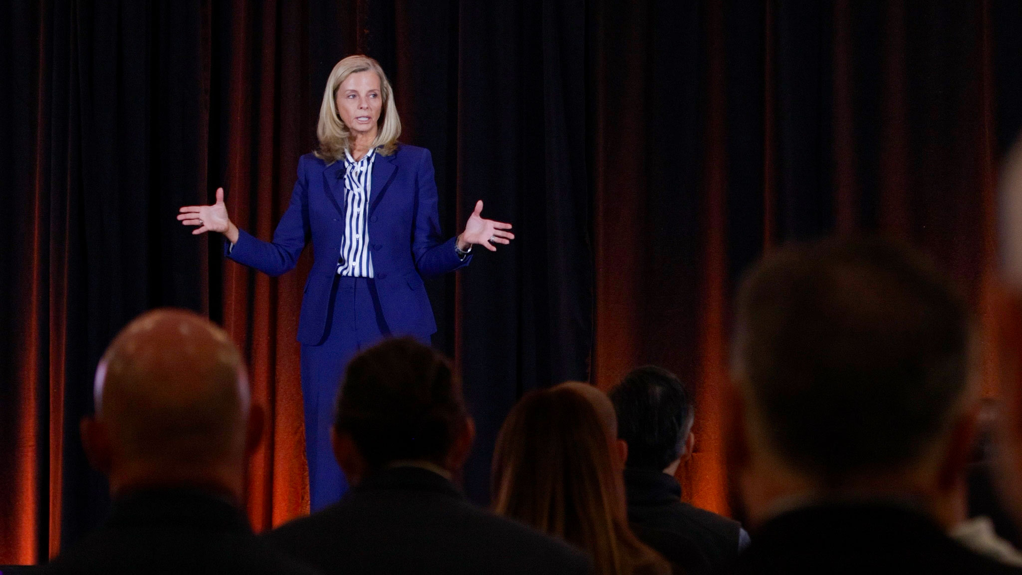 Katie Farmer speaking at BNSF Ag & Energy Summit at Ritz-Carlton Las Colinas